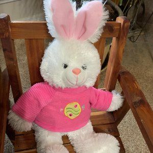 White Easter Bunny wearing pink sweater